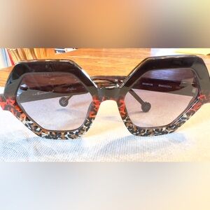 L.A. Eyeworks Geometric Sunglasses 
Model: Bhangra